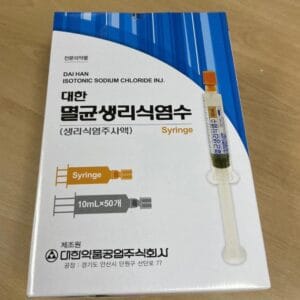 a box of syringe on a table