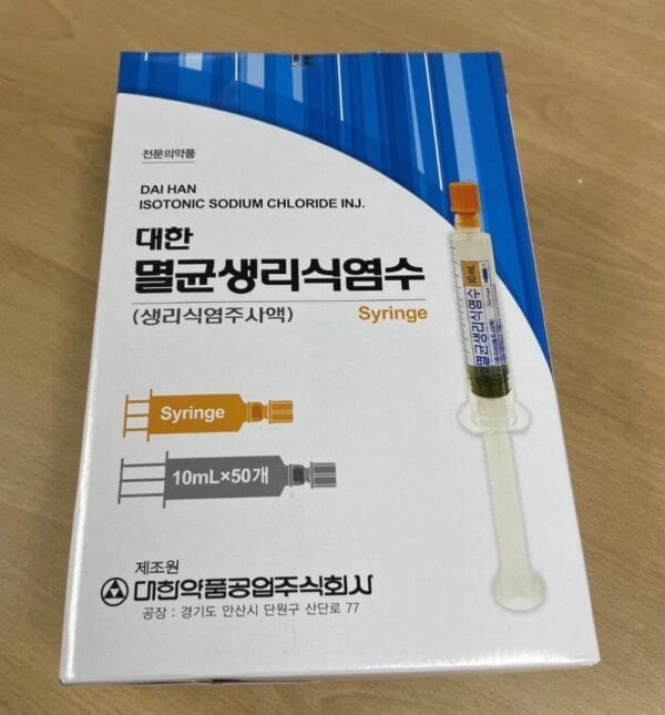 a box of syringe on a table